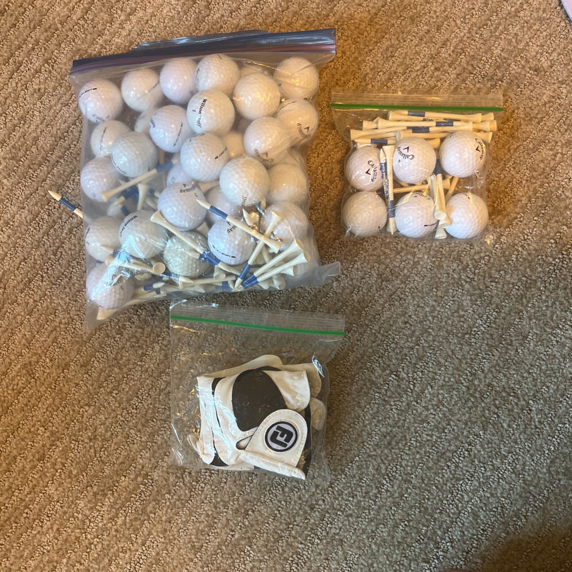 ~45 Calaway and Wilson staff Golf Balls/tees/gloves
