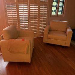 Two Large White Loveseats