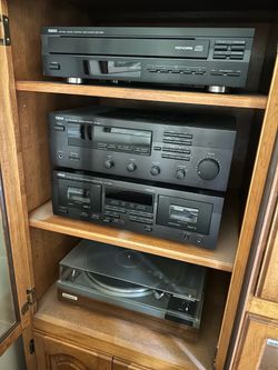 Multifaceted Music player w/ Dual Speakers - play vinyl records, cassettes, CDs, and FM/AM radio
