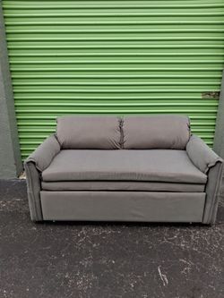 Gray sleeper loveseat