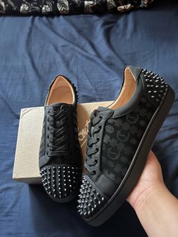 Christian Louboutin with design