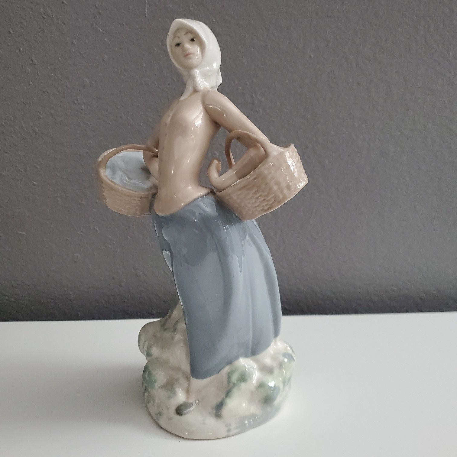 Exquisite Lladro-like porcelain figurine hand-crafted in Spain.