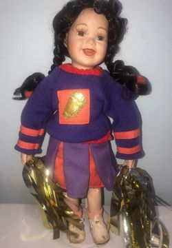 Porcelain cheerleader doll