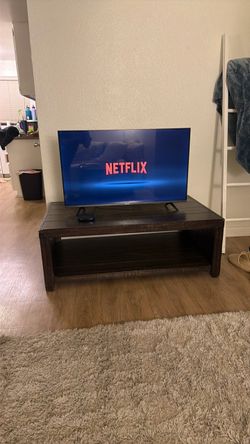 Rectangle  dark wood coffee table or TV stand