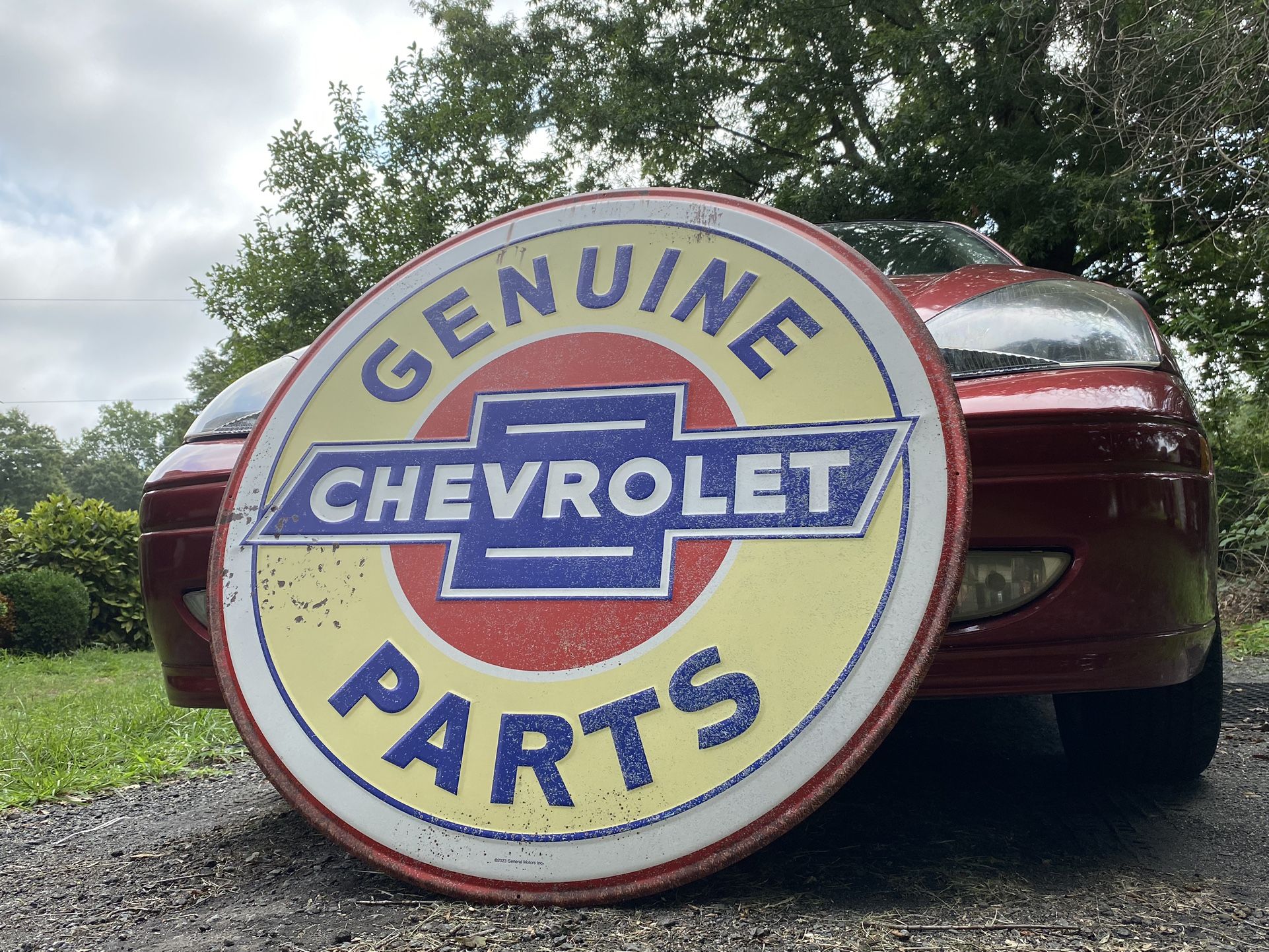 Genuine chevrolet parts sign 3ft in diameter   Would look Awsome in a garage,shed, or barn   Driveway pick up in Kernersville off of union cross road 