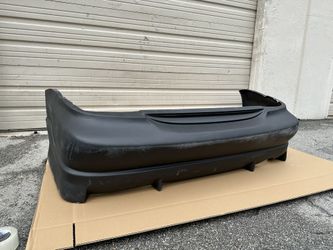 New 2004 - 2007 Mitsubishi Lancer Duraflex Walker Rear Bumper Cover - Part 100576