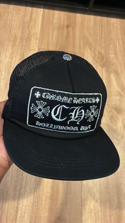 black chrome heart trucker hat