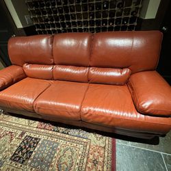 Authentic Leather Couches, Red Color , Good Condition.