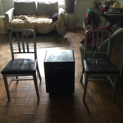 Two Metal Chairs With Small Desk