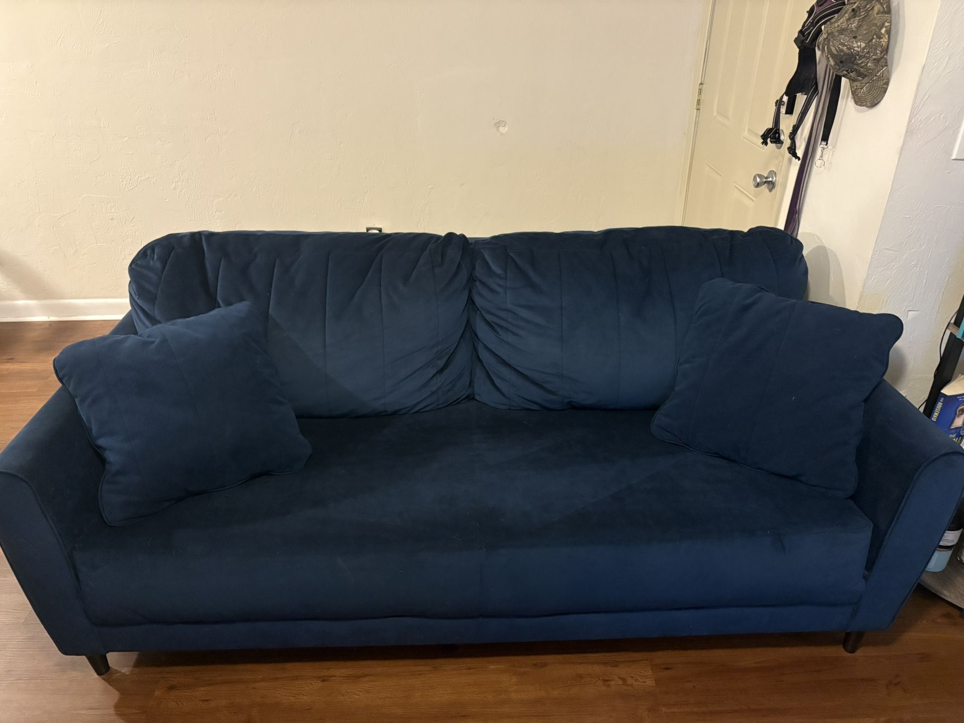 Blue Suede Couch With Pillows