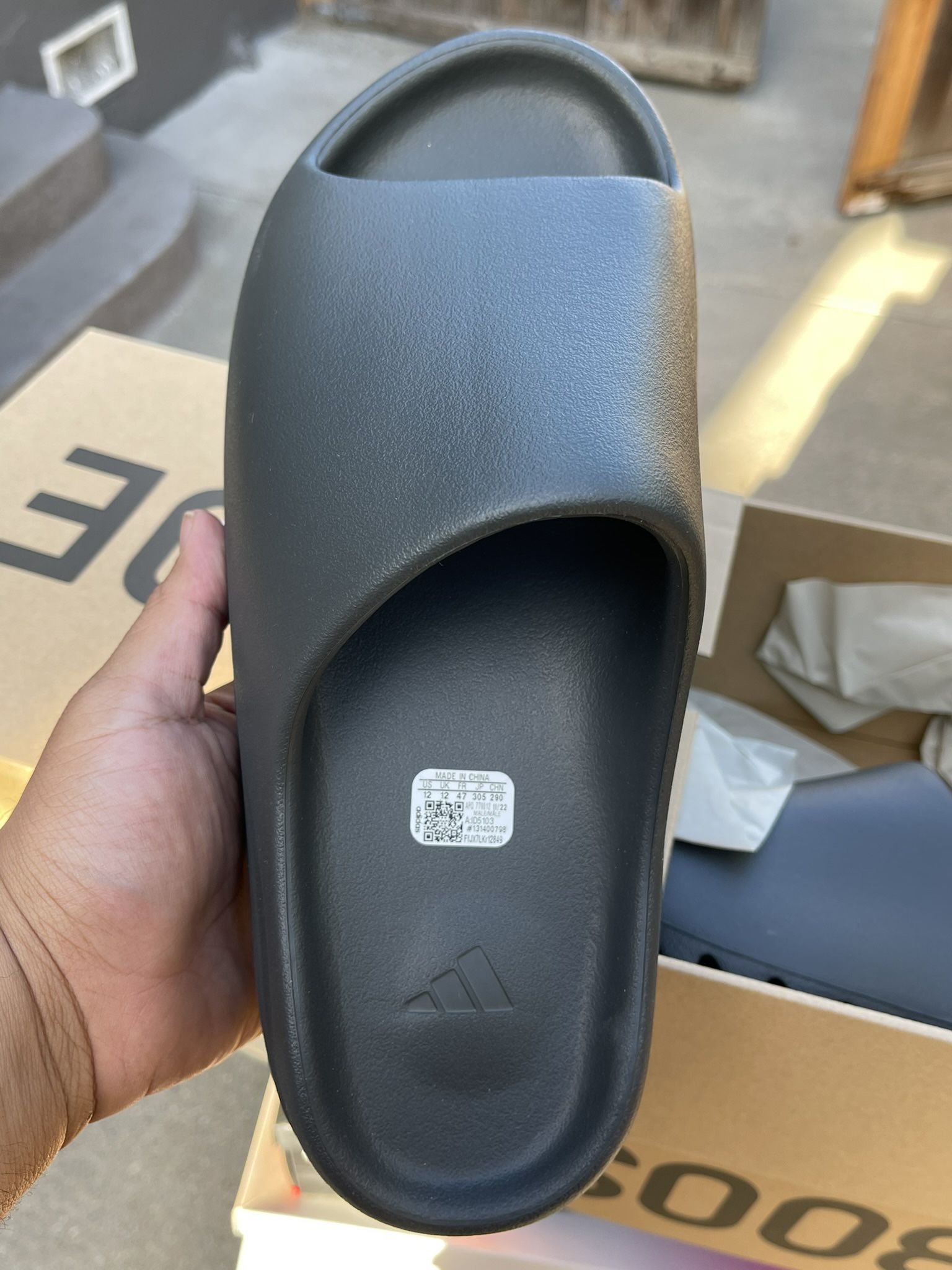 adidas gazelle silver green womens adidas Yeezy Slide Dark Onyx – Story Cape Town main image 1