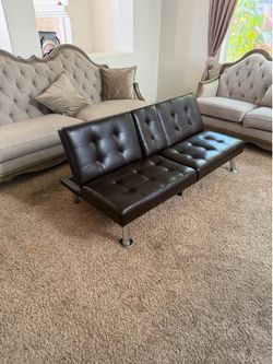 Brown leather sofa bed chair