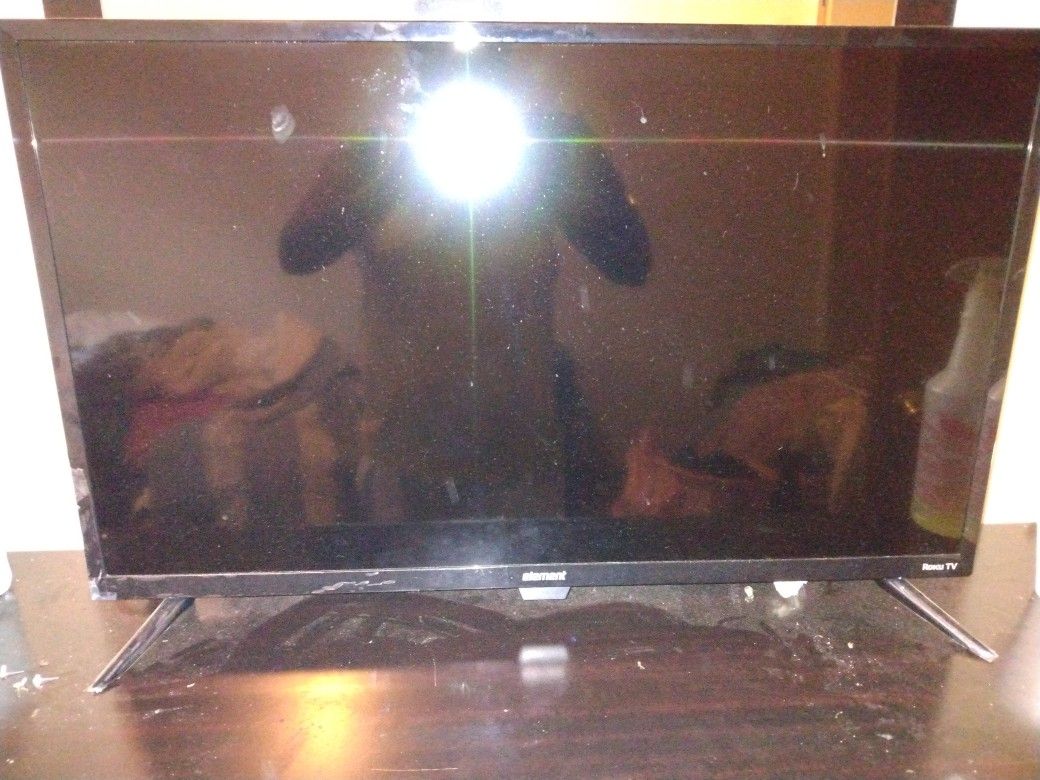 A Coach And Brand New Roku Tv With Remote
