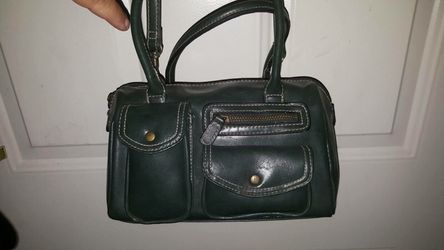 Green pocketbook with storage compartments