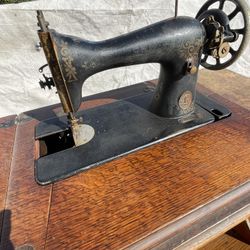 Singer Treadle Sewing Machine In Cabinet