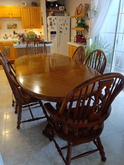 Solid oak table and chairs