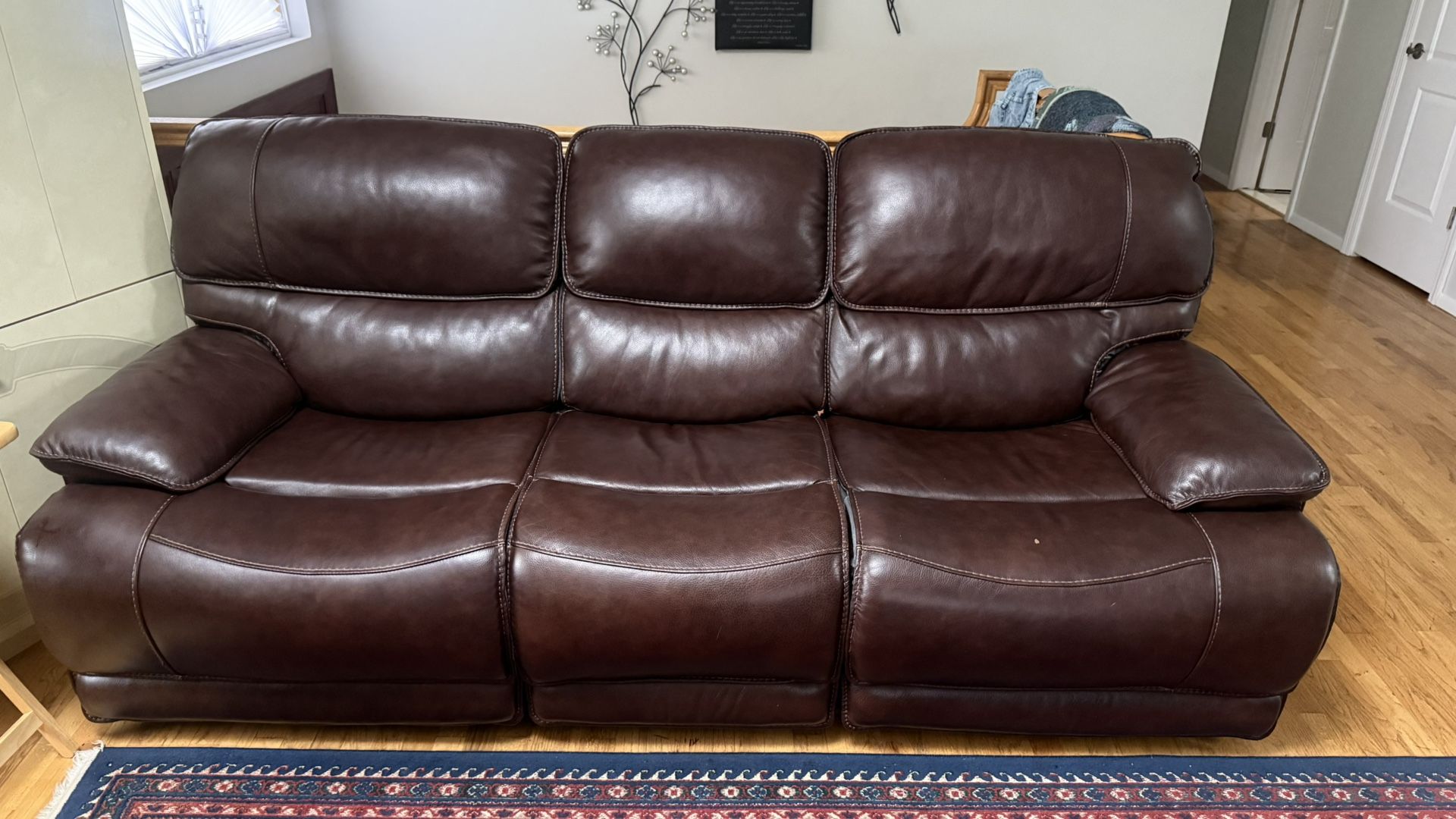 {Raymond & Flanigan} 3 - Piece Leather Espresso Recliner Sofa Set
