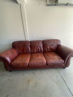 Leather couch, loveseat, chair and ottoman