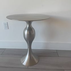 2 Round Silver Tables