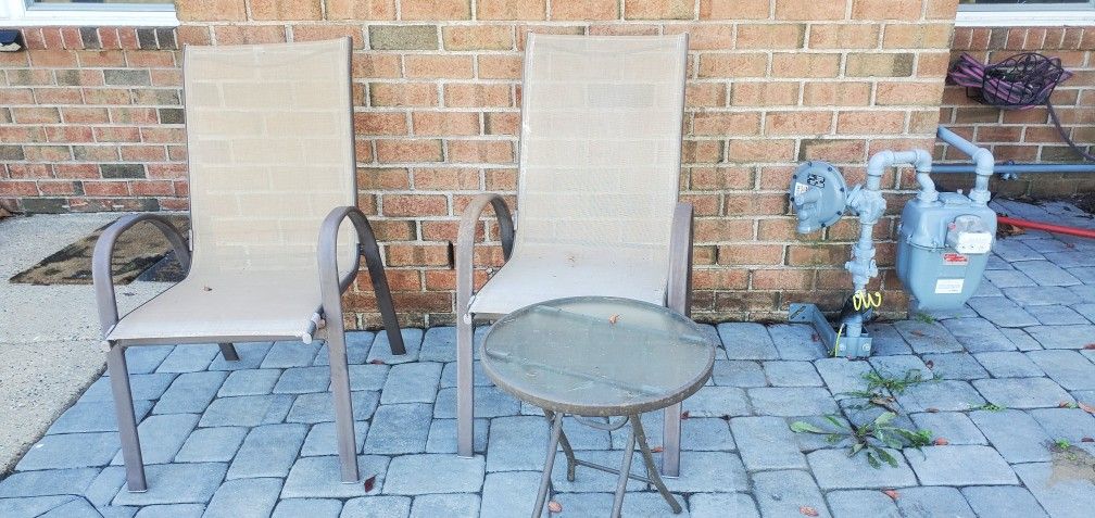 Outdoor Chairs And Small Table