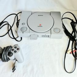 Original Playstation 1 console with controller and memory card
