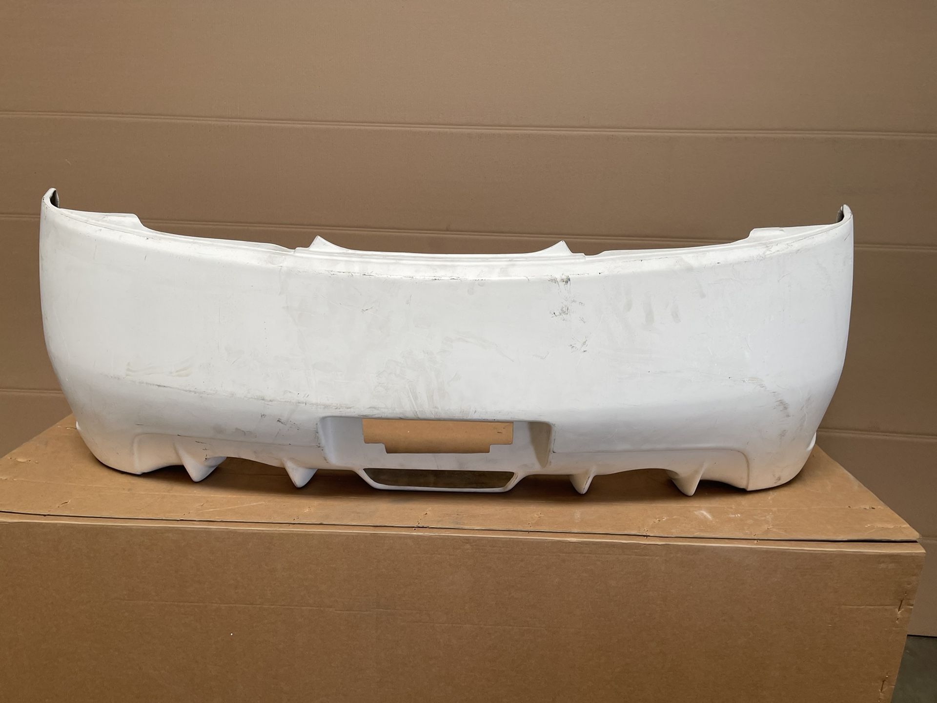 03-07 Infiniti G 35 2dr USACF Imp Style Rear bumper Fiberglass 