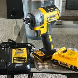 DEWALT 20V MAX Lithium-Ion Brushless Cordless 1/4 in. Impact Driver Kit with 2.0 Ah Battery and https://offerup.com/redirect/?o=Q2hhcmdlci5OZXcvTnVldm