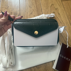 Gucci GG Embossed super mini leather shoulder bag