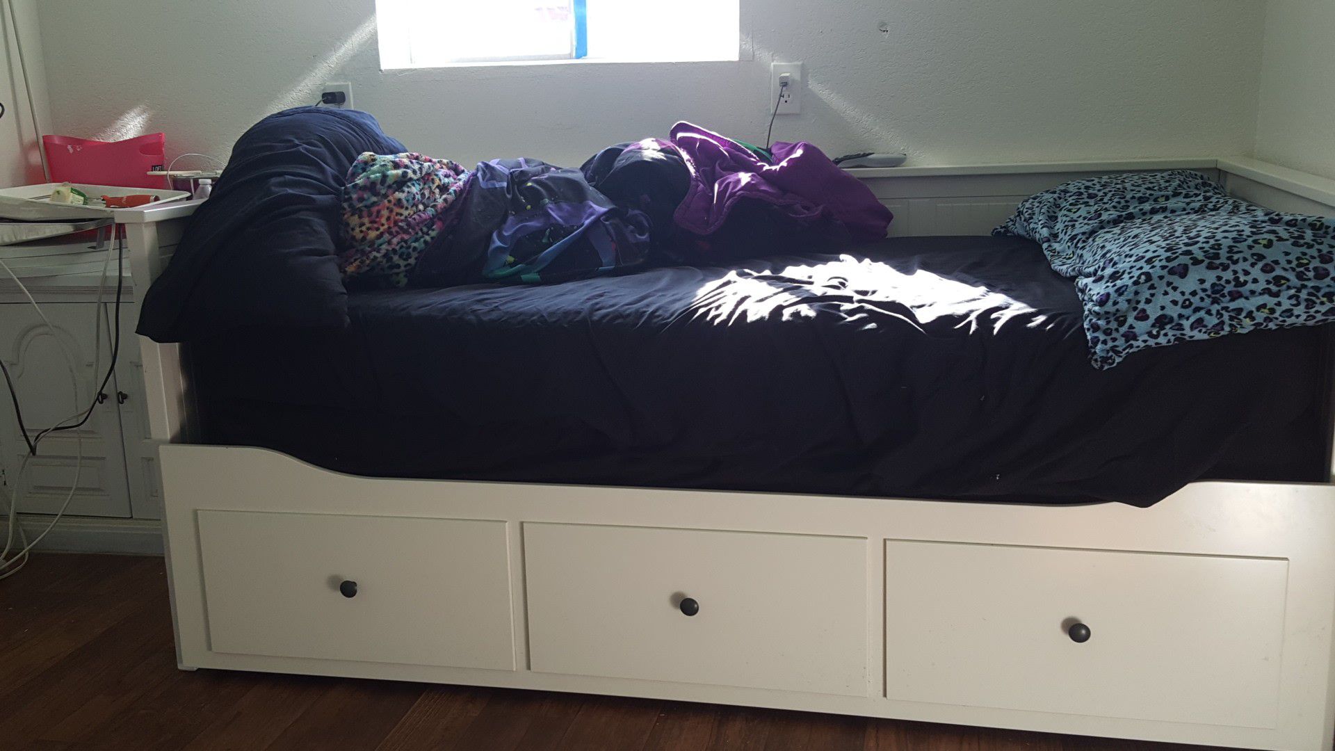 Twin bed with pullout
