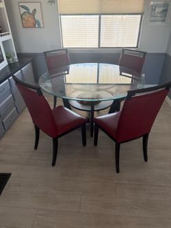 Glass dining room, set red leather chairs