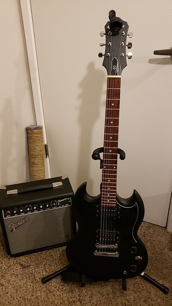 Electric guitar, stand, tuner and amp for Sale in Reno, NV