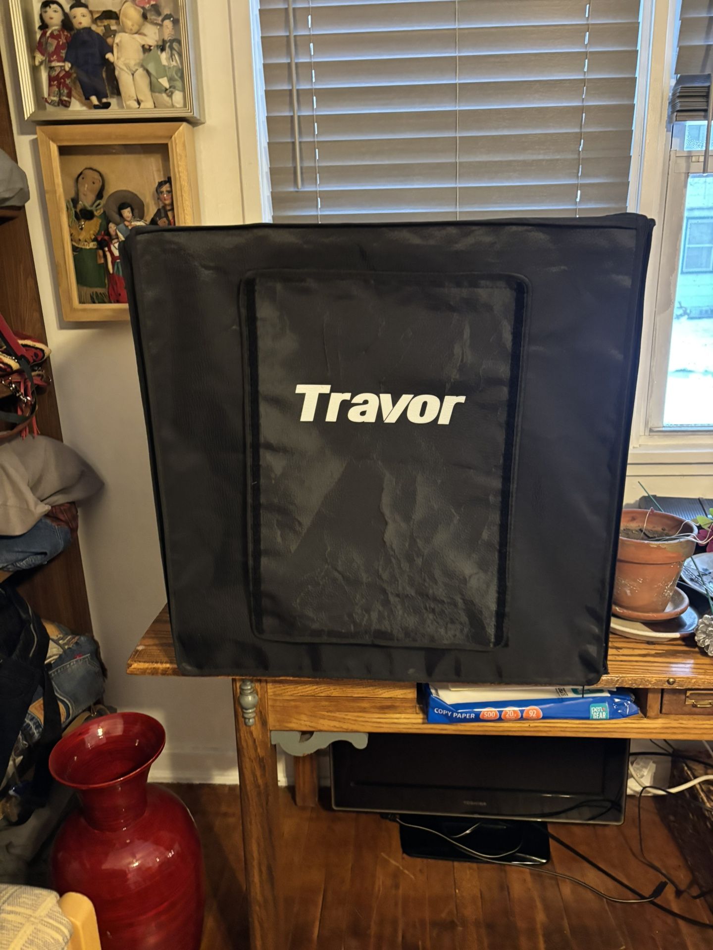 Travor branded photography light box for product photography. 25” pre-owned. 4 backdrop panels