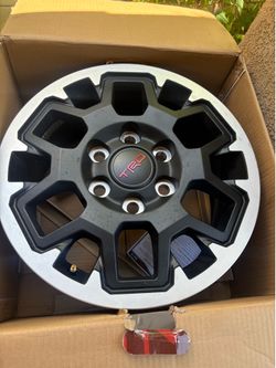 4 Tacoma TRD 17” Rims. Only driven 100 miles.