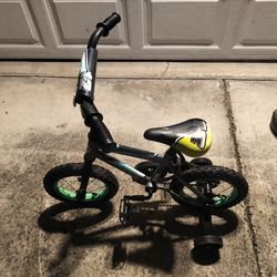12 inch rock it huffy bike with training wheels