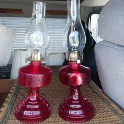 A PAIR OF  VINTAGE  RED  OIL LAMPS  WORK  GREAT  28 Dollars  EACH 