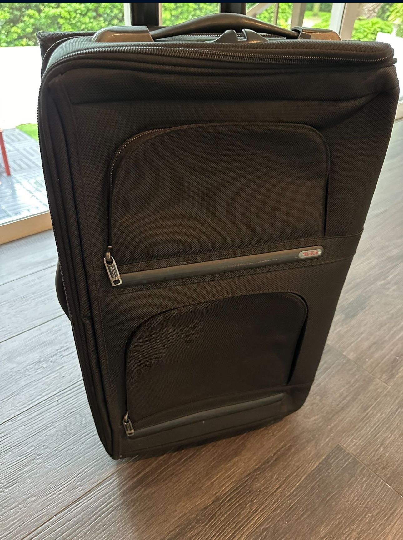 TUMI Carry On luggage
