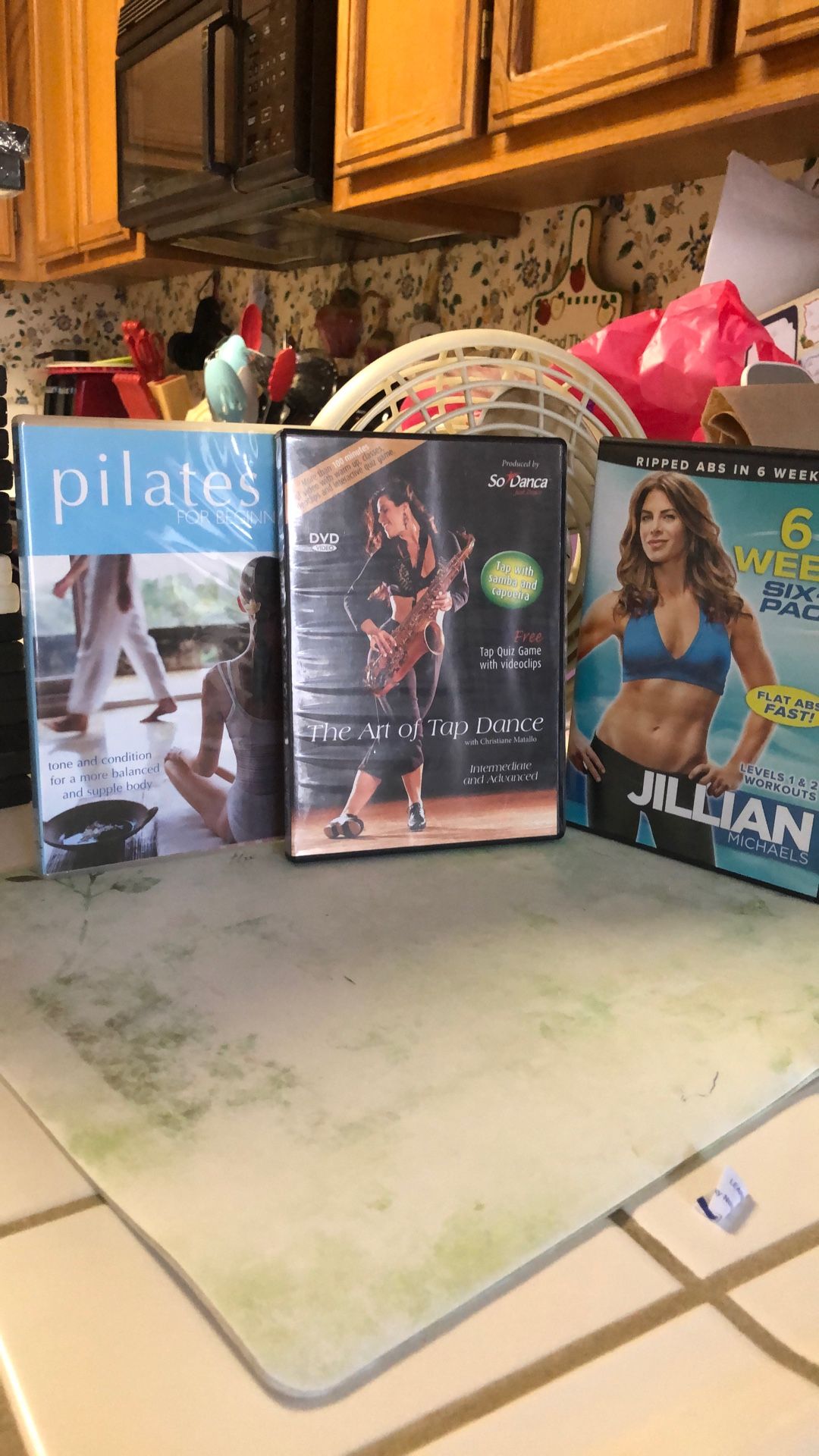 3 Work-Out DVDs $2. Ea.