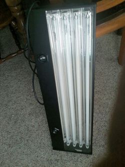 Coralife light for tank. Multi lights with fans