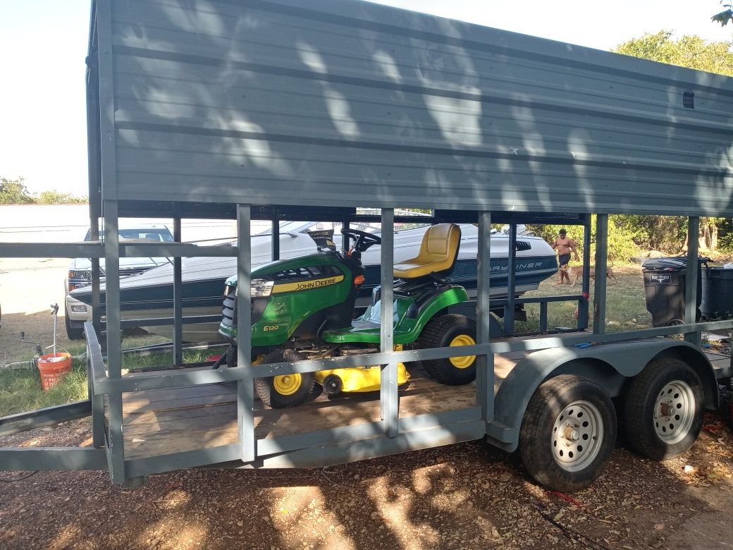 John Deere riding lawn mower and the trailer to pull your equipment