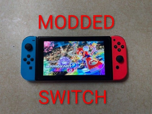 Nintendo Switch V2 With 100 Switch Games +7500 Retro Games