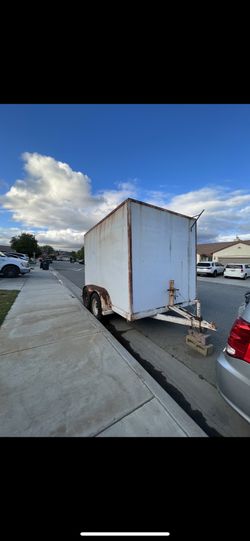 Utility trailer enclosed. W Ramp door