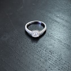 Moissanite Engagement Ring. 0.83carat stone, 925 sterling silver band. Size 8