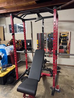 Rep Fitness power rack my w/lat pull down and low row