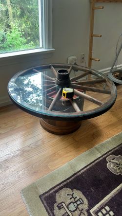 Unique vintage wagon wheel coffee table with glass top