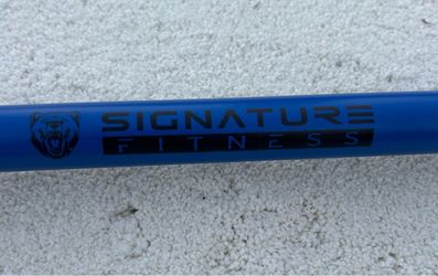 New heavy duty 7 foot signature Olympic bar capacity 1500 pounds