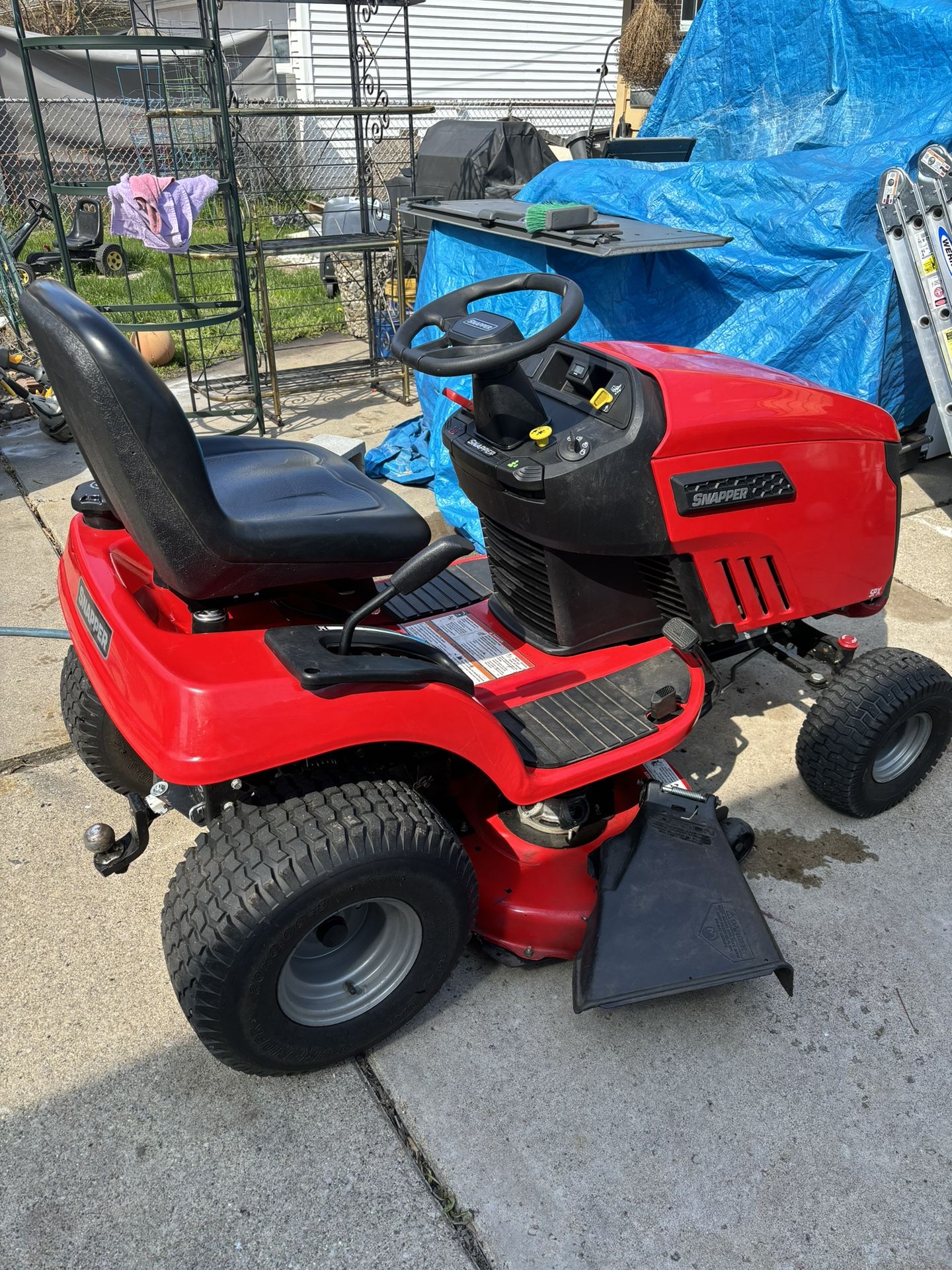 Red ride lawnmower