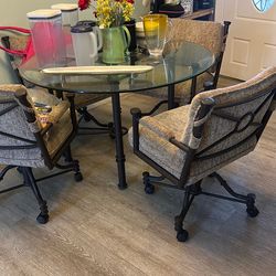 Glass table with 4 chairs