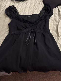 Black ruffle shirt