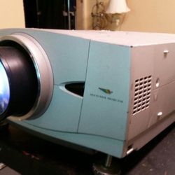 Sanyo video theater projector and 7 feet pull down screen. 