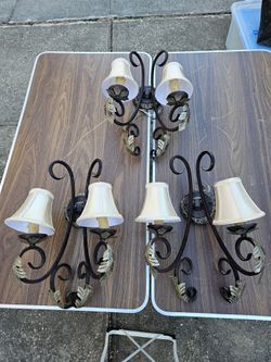 3 large iron sconces